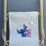Saco Bordado com Stitch e Angel
